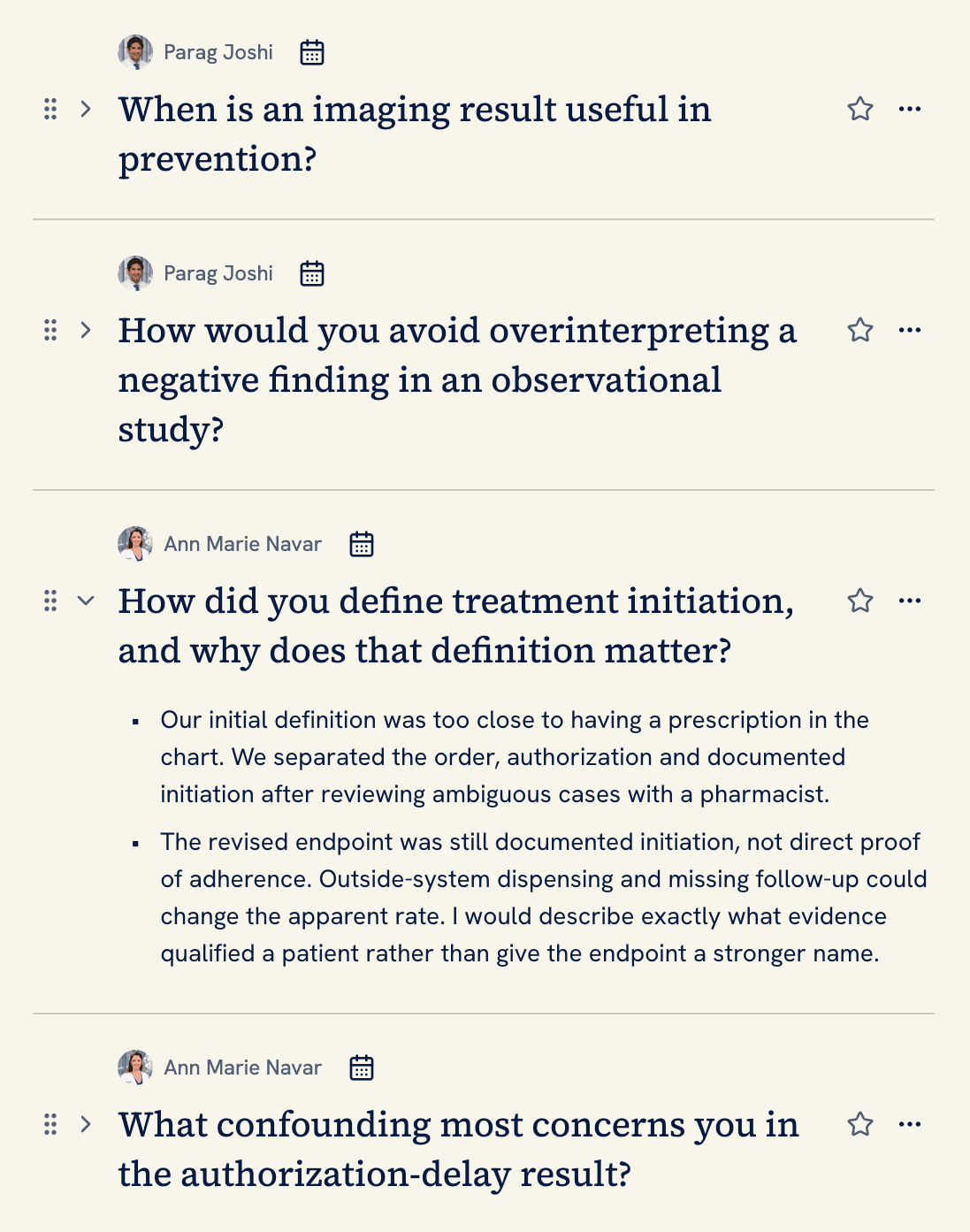 Practice questions tied to two interviewers, one opened to an answer outline about a research definition